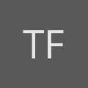 Tom Fairchild avatar consisting of their initials in a circle with a dark grey background and light grey text.