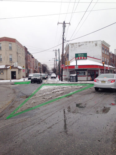 This Philadelphia intersection was in need of some pedestrian improvements, as the patterns in the snow helped illustrate. Image: This Old City