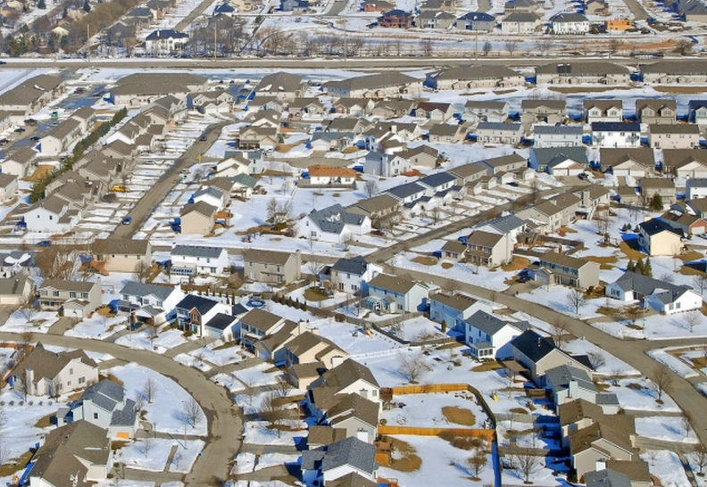 It will be very hard to change transportation patterns in communities like this one in Bloomington, IL. Credit: Tim, Flickr