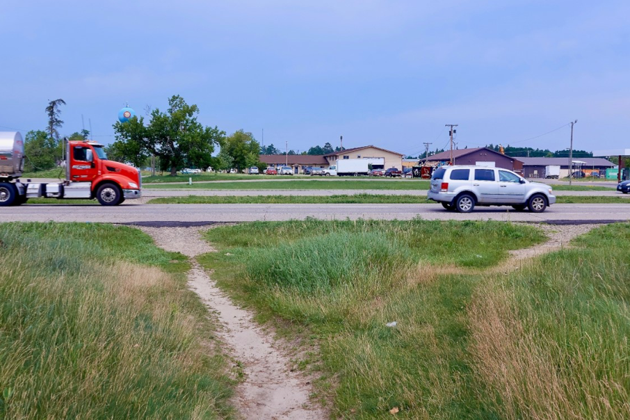 Foot paths worn by State Highway 1 near the Red Lake Nation tribal lands in Minnesota. Photo: Guillermo Narvaez