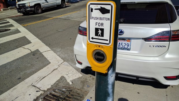 Advocate Urges Removal of S.F.’s “Beg Buttons”