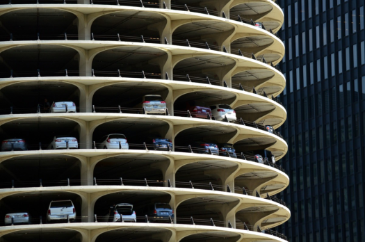 Minimum parking, maximum rent: Let’s cut tenants a break by ending parking minimums