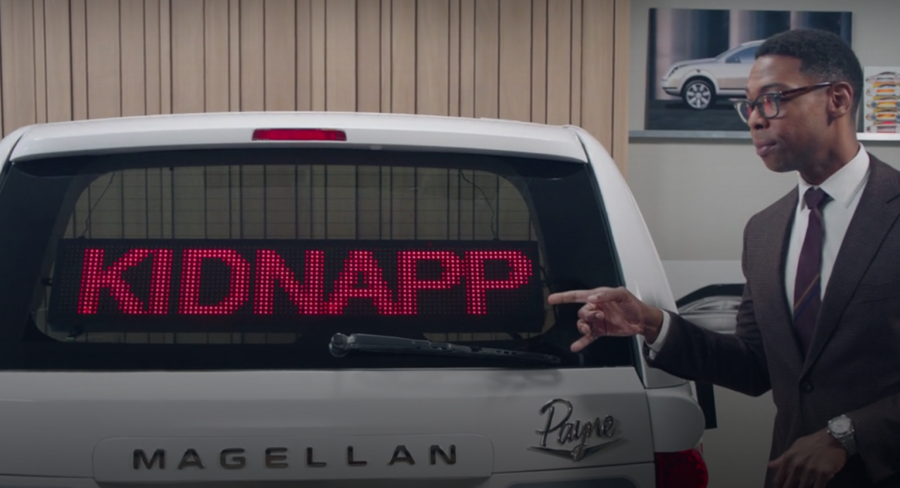 Payne Motors' head auto designer, Cyrus (Michael Benjamin Washington), demos an unconventional safety feature