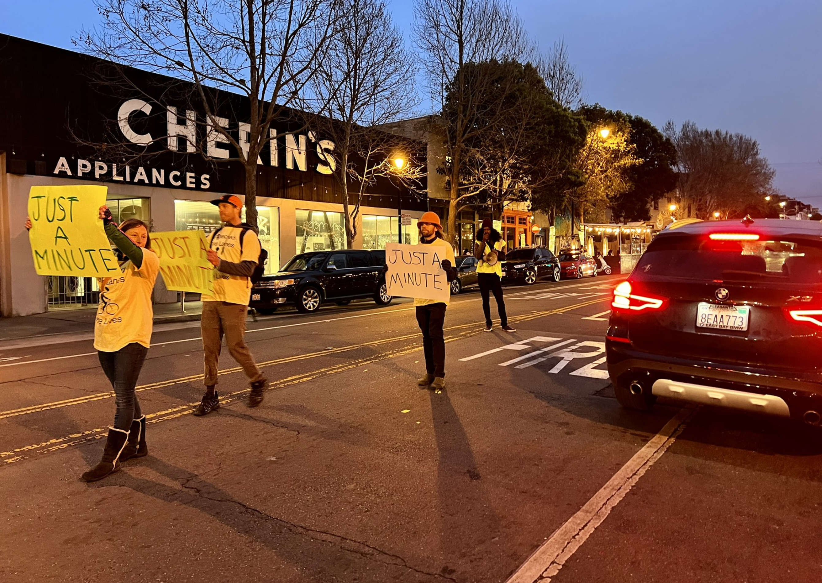 A "Just a Minute!" protest against drivers parking in bike lanes. Photo: Safe Street Rebel