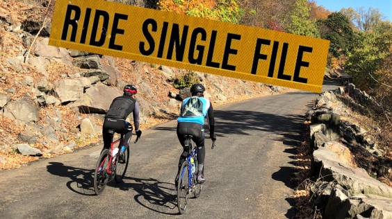 Opinion: The Problem With ‘Ride Single File’ Signs